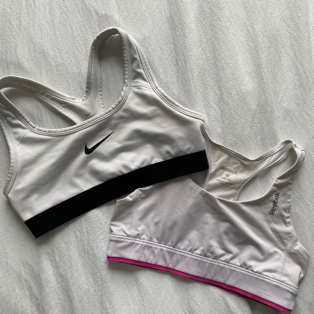 white nike and reebok sports bras
